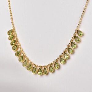 25.65Carat Natural Peridot, 18KT Yellow Gold Plate on 925 Sterling Silver.