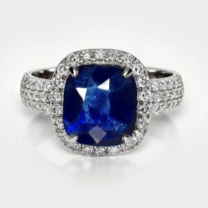 4.21Carats Intense Deep Blue Natural Sapphire & 0.71Carat Natural SI1 Diamond Ring.14KT White Gold.