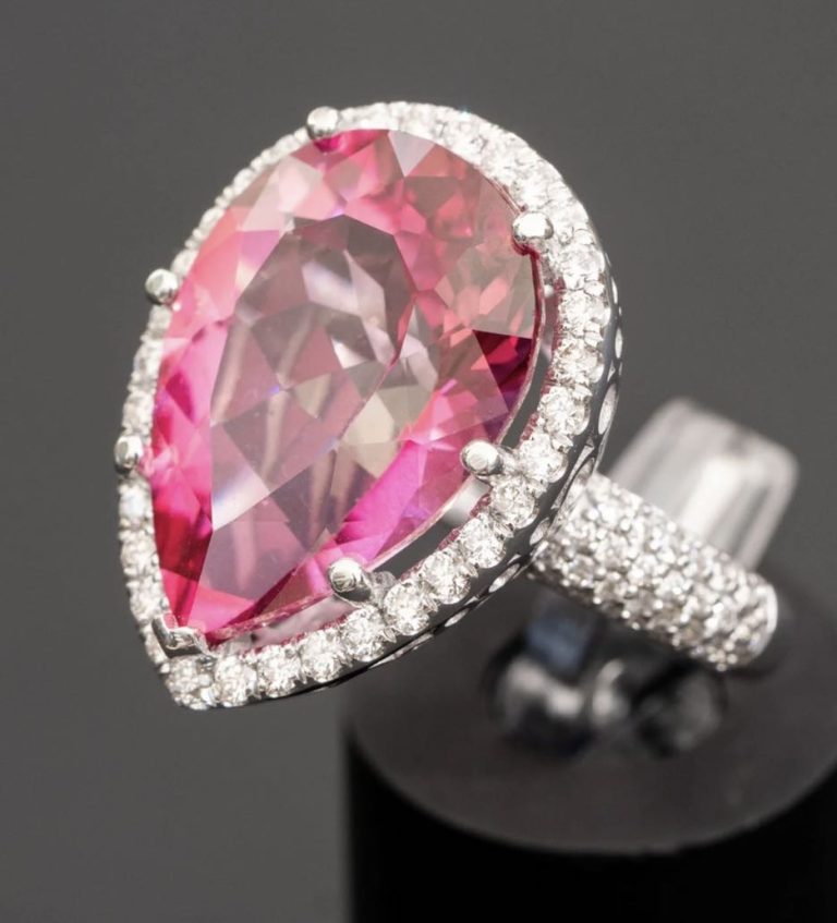 18.00 Carat Natural Pink Topaz Ring with 1.20 Carats of Natural Diamonds.